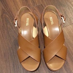 Michael Kors leather sandal.